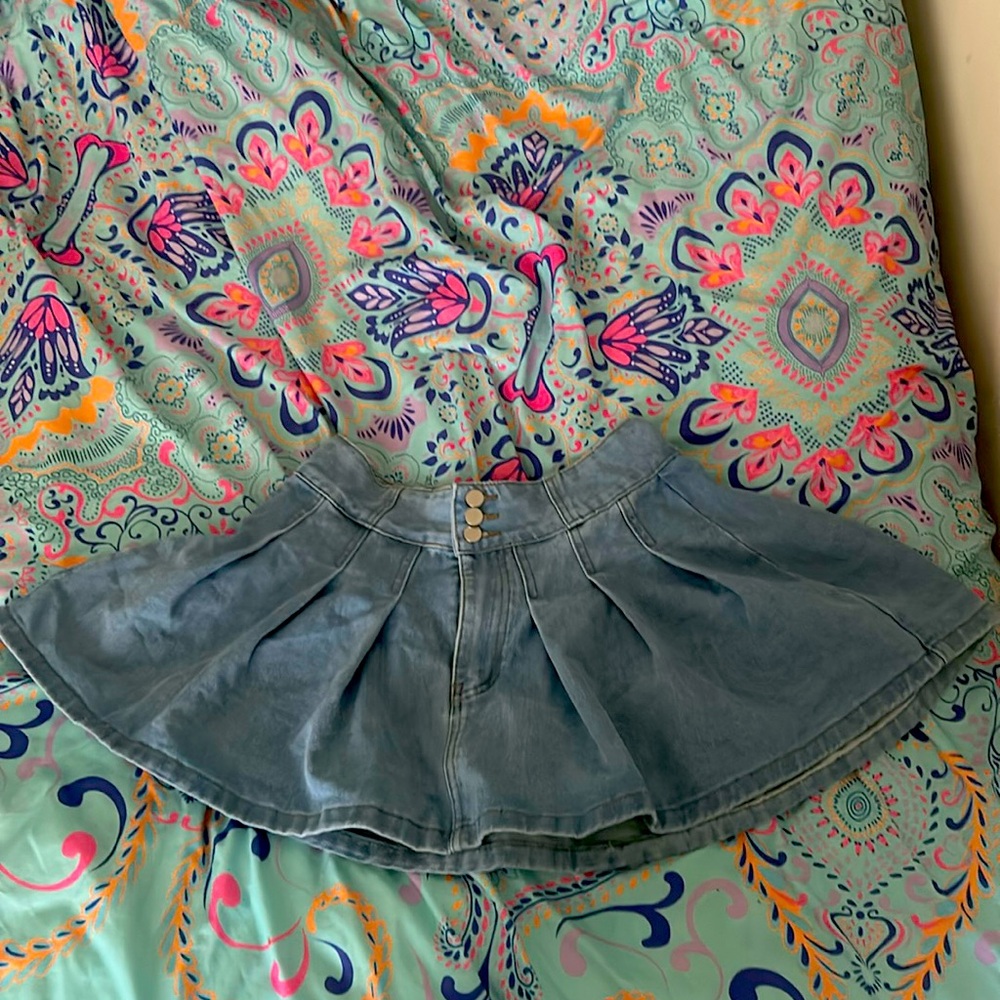 Light blue denim mini skirt
